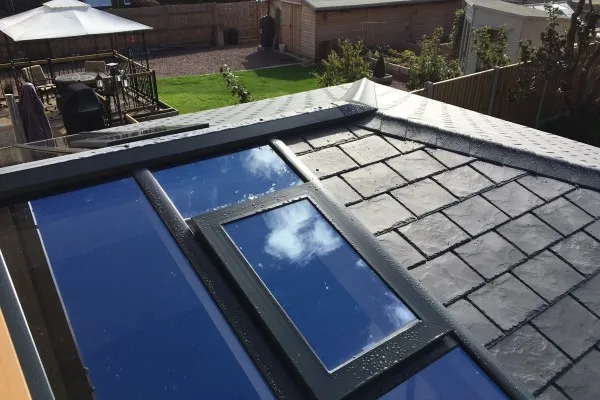 An Ultraroof House Extension Installation with High Tech Windows